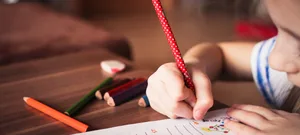 Mrs_Brown-L-1 Kindergarten: A girl painting and writing