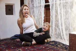 26-07-happiness-I’ll-tell-you-Nadine-Schweizer-Parents’ Magazine-ed Happiness and family: a mother and son stick out their tongues