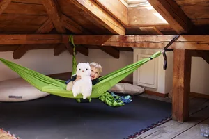 26-07-9-questions-about-happiness-Swiss-Parents’ Magazine-ed Questions about happiness: A boy in a green hammock