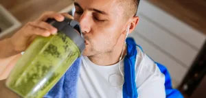 young-man-drinks-shake_L-scaled Muscle mania and protein consumption